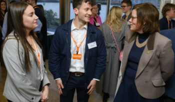Apprentices Heather Warwick and James Morris with Alex Baker MP
