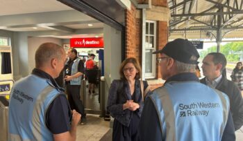 Alex Baker MP with staff at Farnborough station