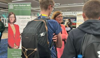 Alex Baker MP talking to students at the Freshers Fair