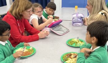 Alex Baker MP with children at Farnborough Grange Nursery and Infant Community School