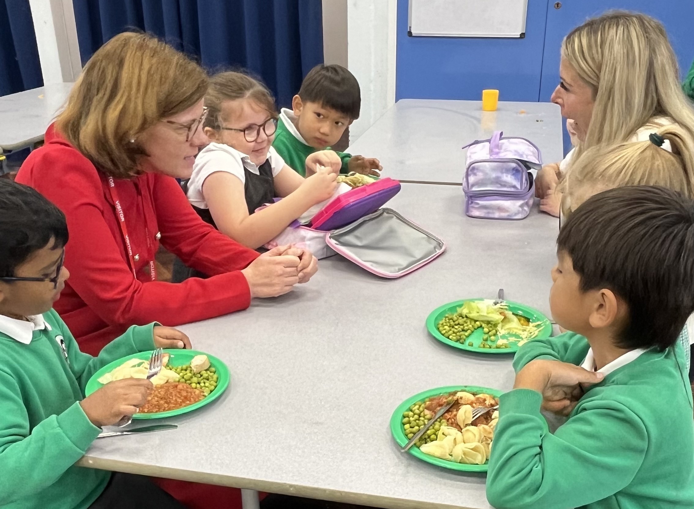 Alex Baker MP with children at Farnborough Grange Nursery and Infant Community School