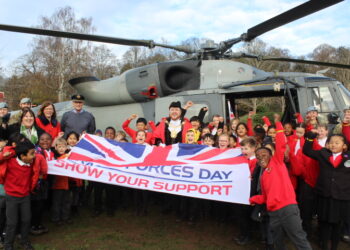 Children from Talavera School receive the Armed Forces Day flag