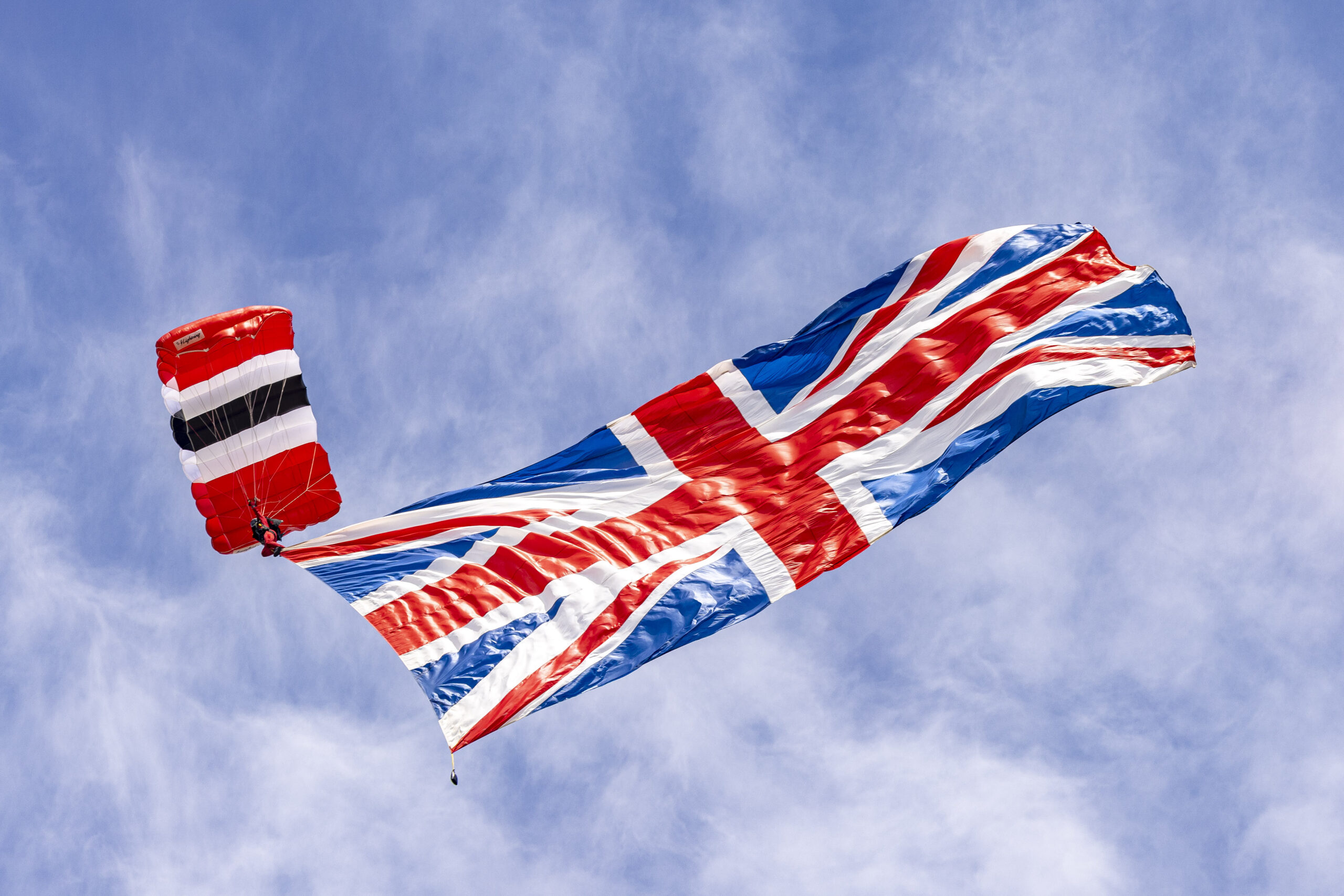 British Army Red Devils parachute display team performing at the Armed Forces Day National event in Aldershot